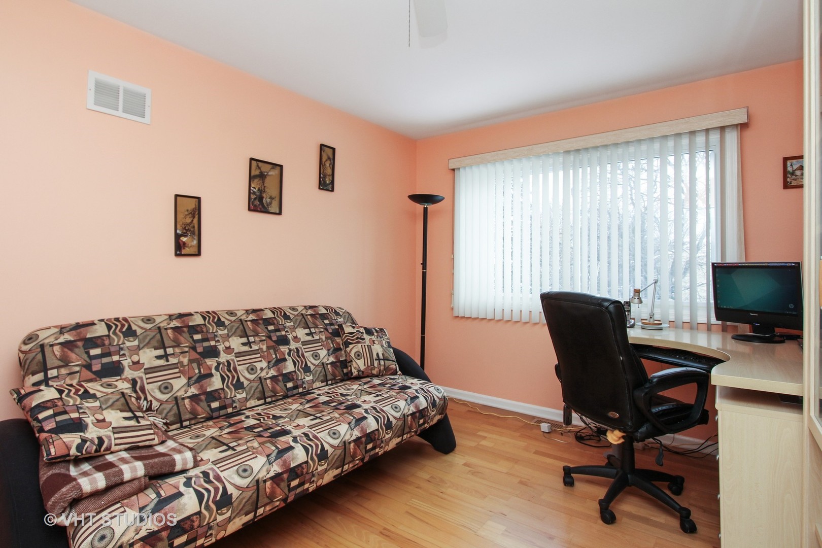 1104 Devonshire Road Buffalo Grove, IL 60089 - Photo 7 of 10 a bedroom with a bed and a chair