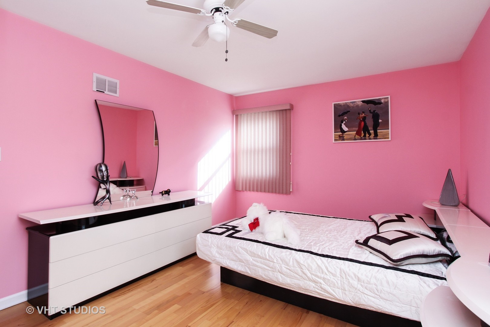 1104 Devonshire Road Buffalo Grove, IL 60089 - Photo 9 of 10 a bedroom with a bed and a mirror