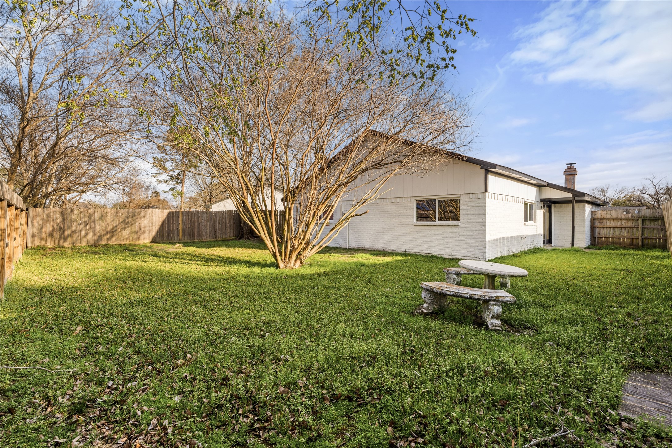 9809 Wren Court Conroe, TX 77385 - Photo 21 of 22 a front view of a house with a yard