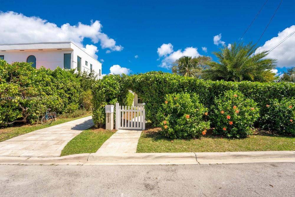 9025 Hawthorne Avenue Surfside, FL 33154 - Photo 1 of 58 a view of a house with a street