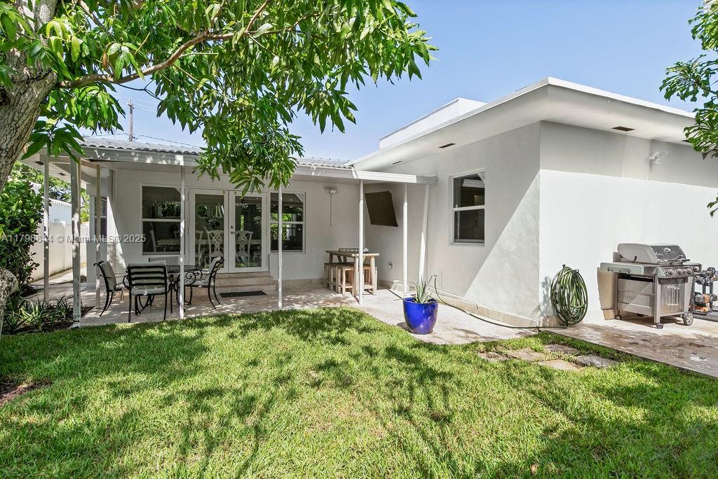 9025 Hawthorne Avenue Surfside, FL 33154 - Photo 18 of 58 a view of a house with backyard
