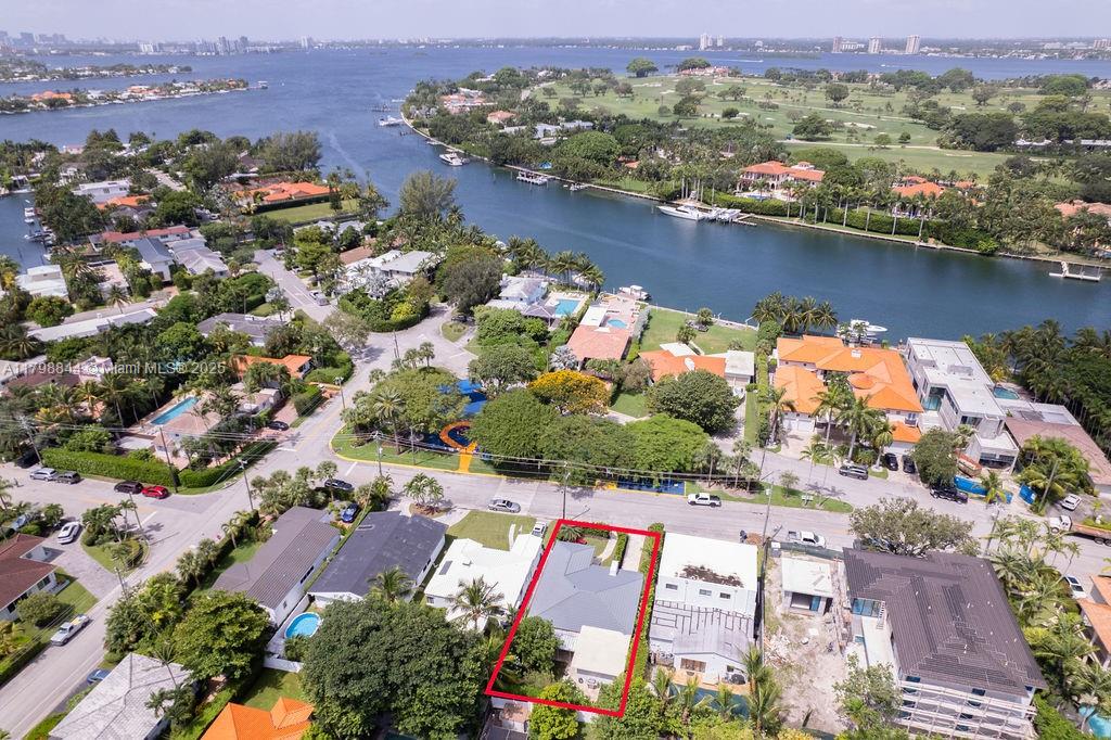 9025 Hawthorne Avenue Surfside, FL 33154 - Photo 43 of 58 an aerial view of residential houses with outdoor space