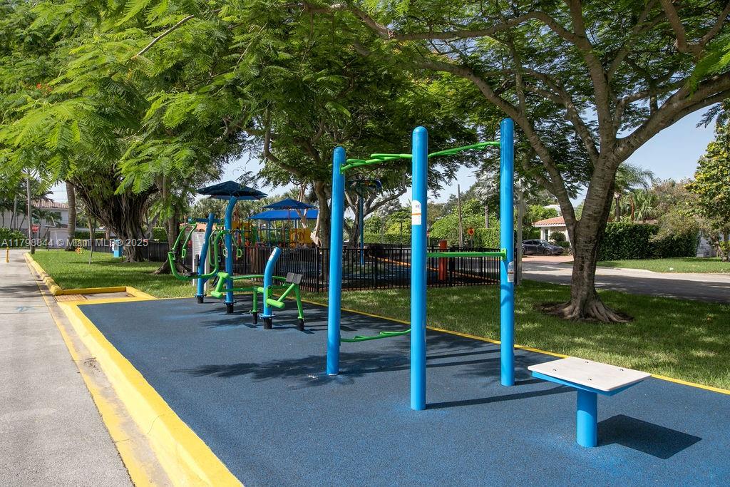 9025 Hawthorne Avenue Surfside, FL 33154 - Photo 48 of 58 a view of a park with slide