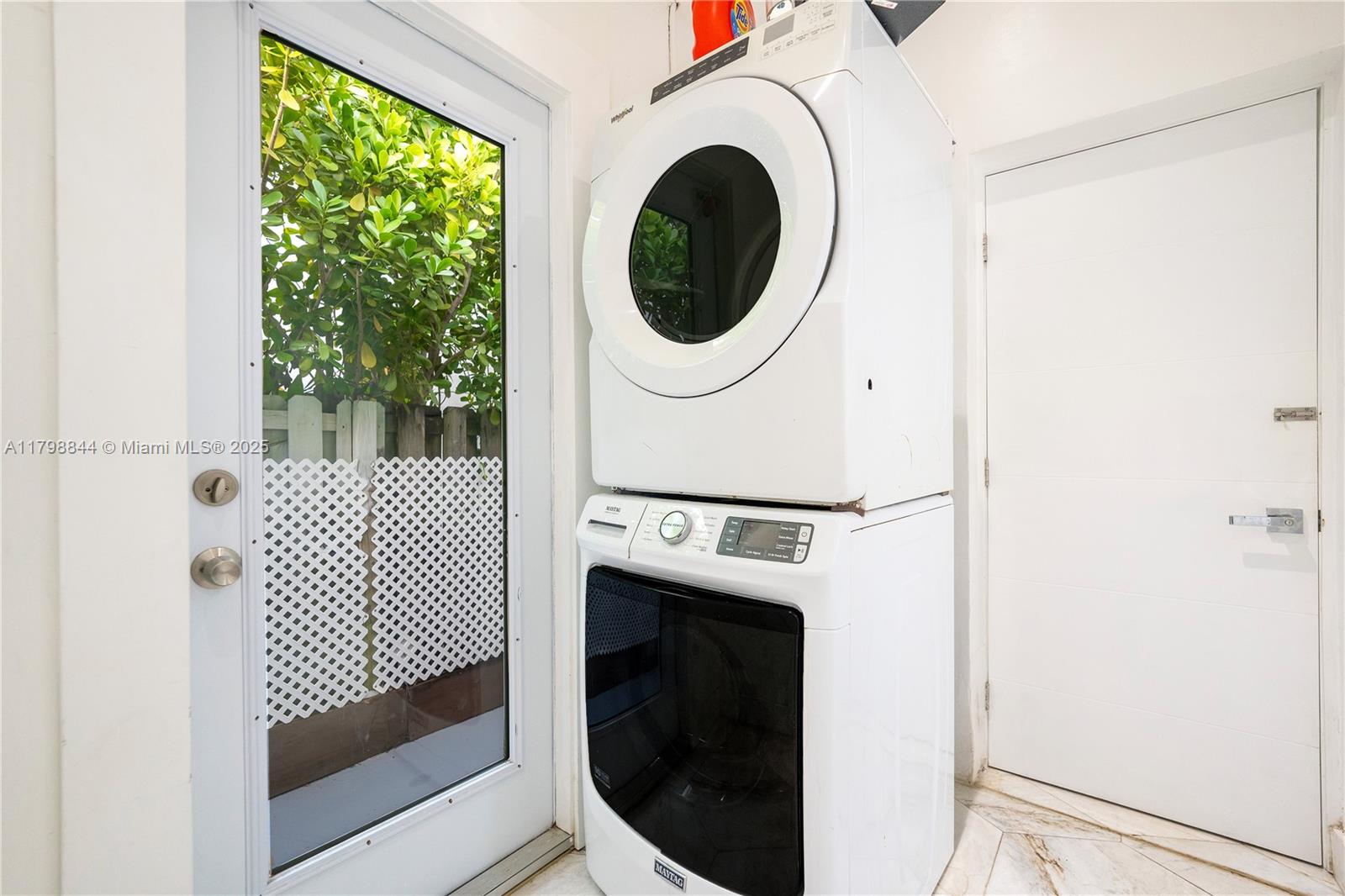 9025 Hawthorne Avenue Surfside, FL 33154 - Photo 49 of 58 a utility room with dryer and washer