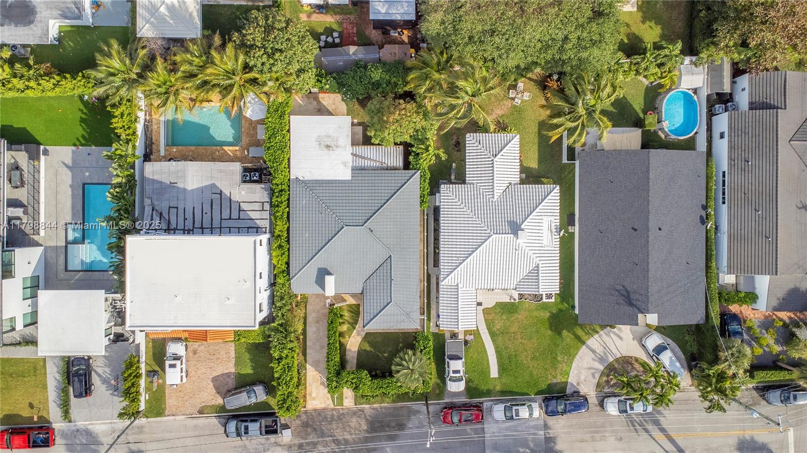 9025 Hawthorne Avenue Surfside, FL 33154 - Photo 51 of 58 an aerial view of houses with outdoor space