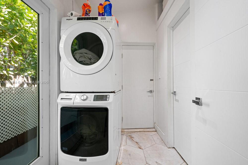 9025 Hawthorne Avenue Surfside, FL 33154 - Photo 54 of 58 a utility room with dryer and washer