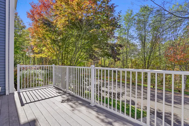 a view of a wooden roof deck