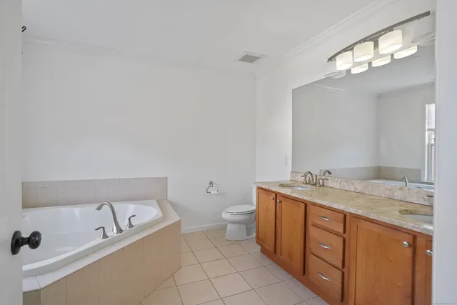 a bathroom with a shower and a tub