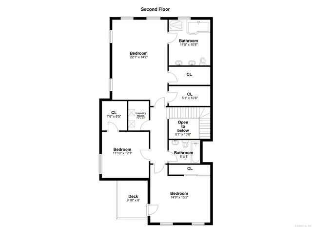 a view of a brick building next to a yard