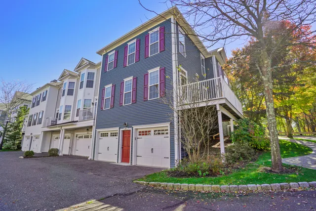 a view of a building with a yard