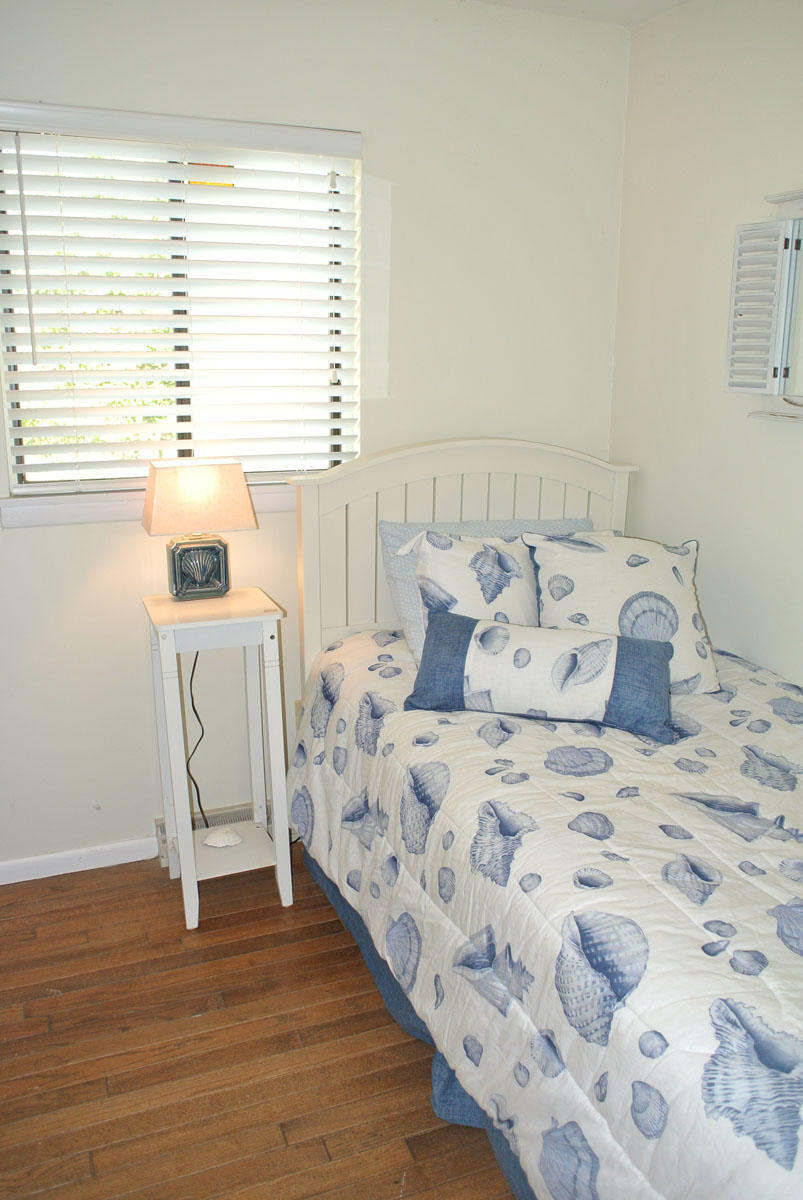 38 Fells Pond Road Mashpee, MA 02649 - Photo 15 of 22 a bedroom with a bed and a window