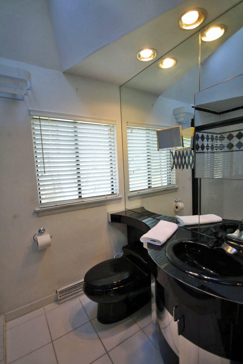 38 Fells Pond Road Mashpee, MA 02649 - Photo 17 of 22 a kitchen with a stove and a window