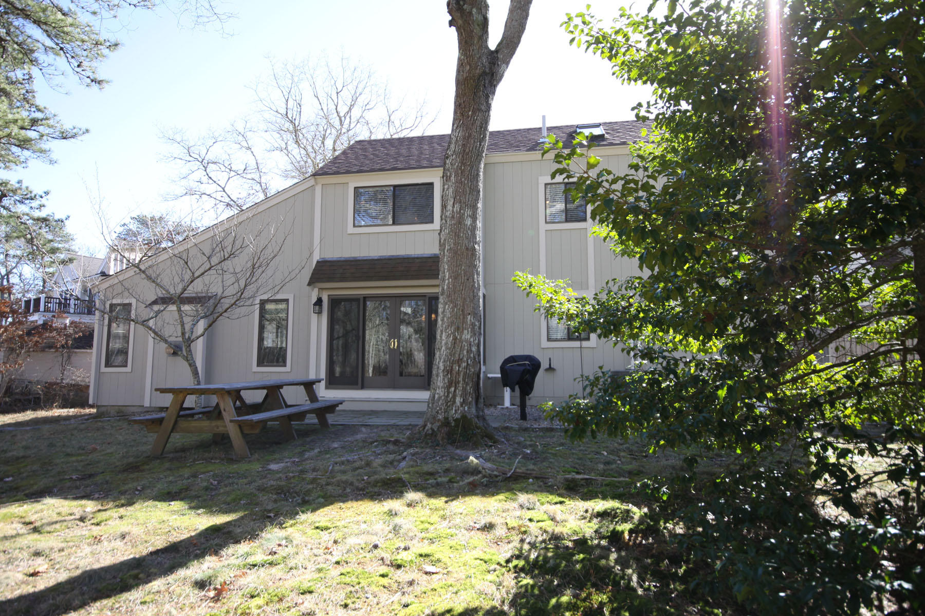 38 Fells Pond Road Mashpee, MA 02649 - Photo 20 of 22 a view of a house with a yard