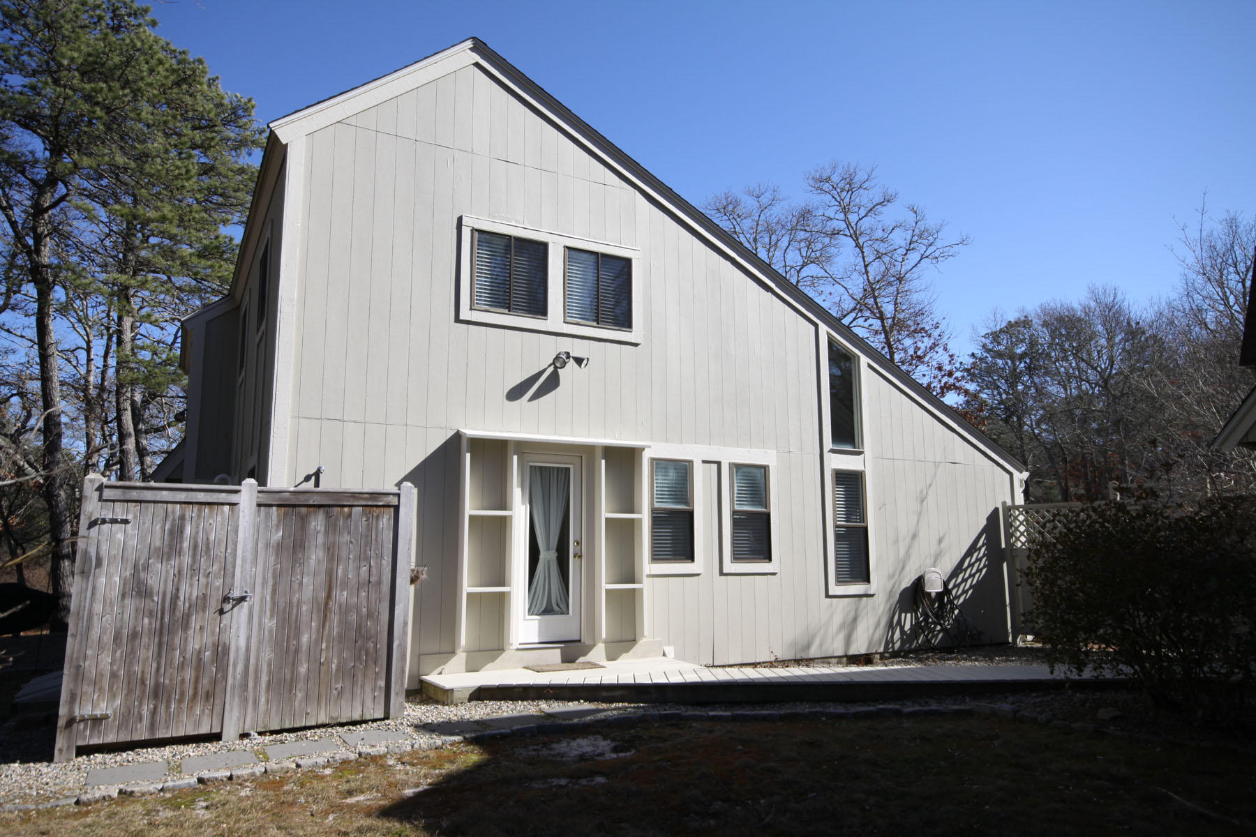 38 Fells Pond Road Mashpee, MA 02649 - Photo 21 of 22 a front view of a house with a yard