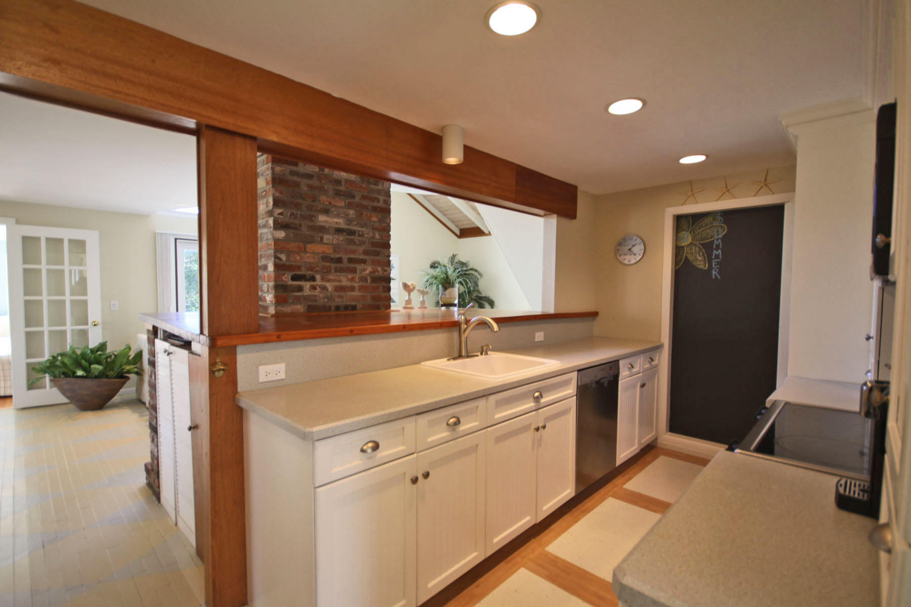 38 Fells Pond Road Mashpee, MA 02649 - Photo 3 of 22 a view of a kitchen with a sink and a large window