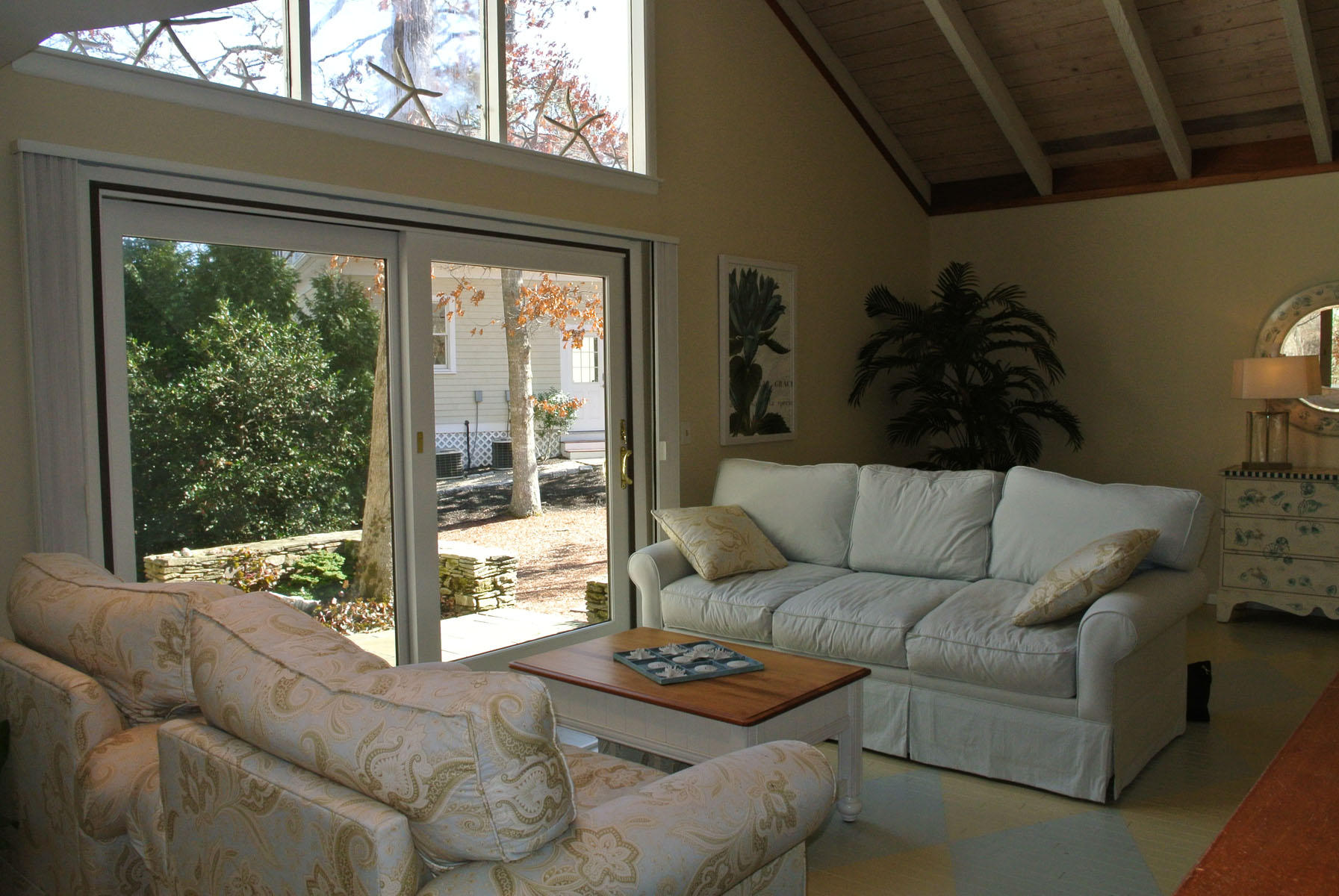 38 Fells Pond Road Mashpee, MA 02649 - Photo 10 of 22 a living room with furniture and a large window