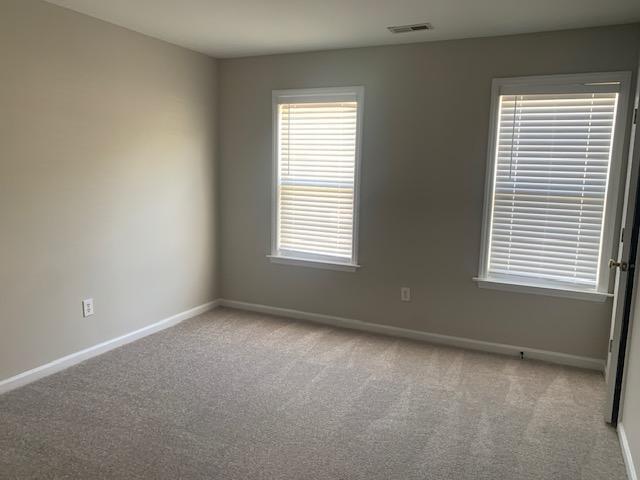 8320 Hobhouse Circle Raleigh, NC 27615 - Photo 8 of 16 a view of an empty room with a window