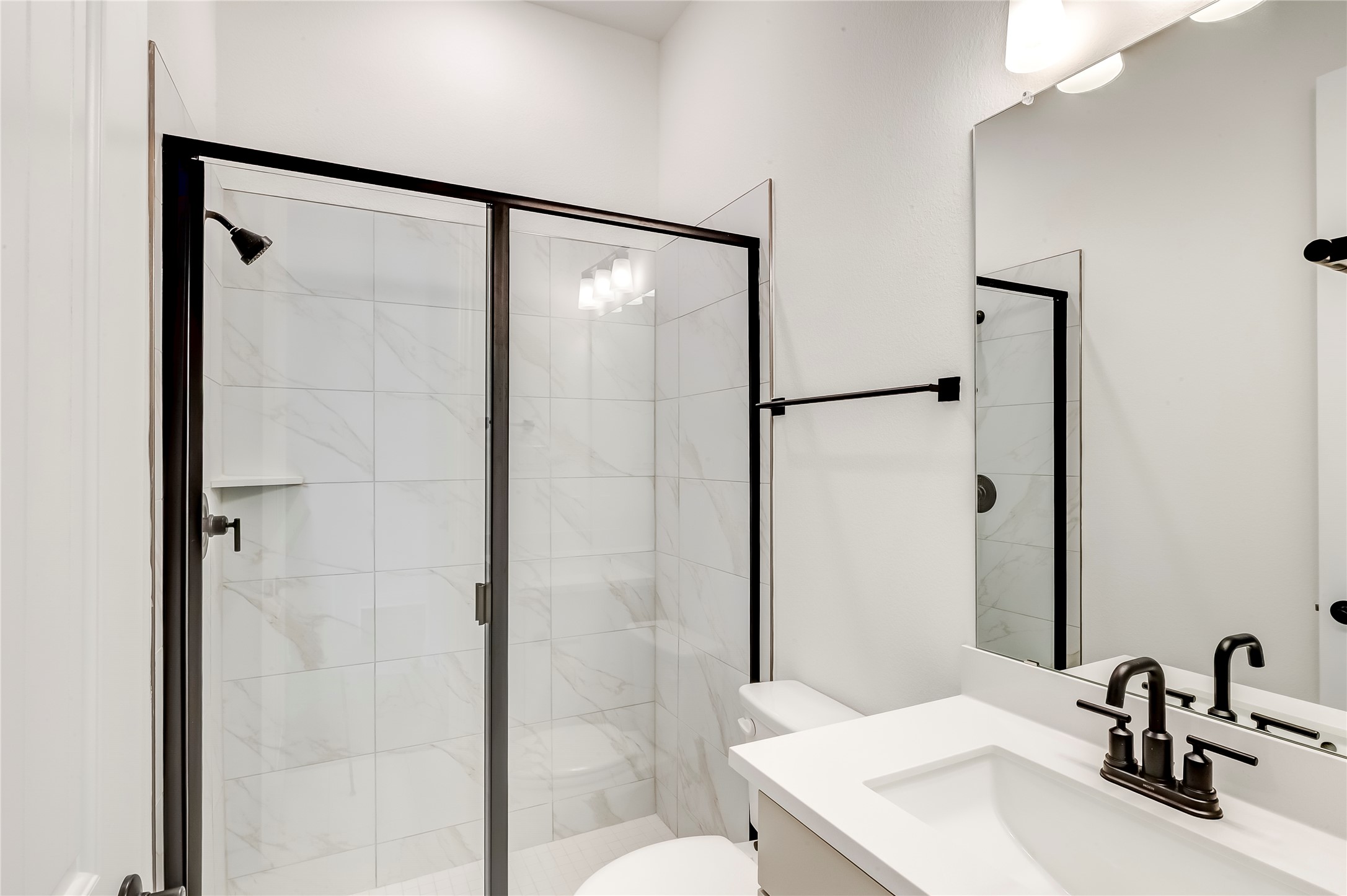920 Old Gdn Road Leander, TX 78641 - Photo 24 of 39 Full bath featuring a shower stall and vanity