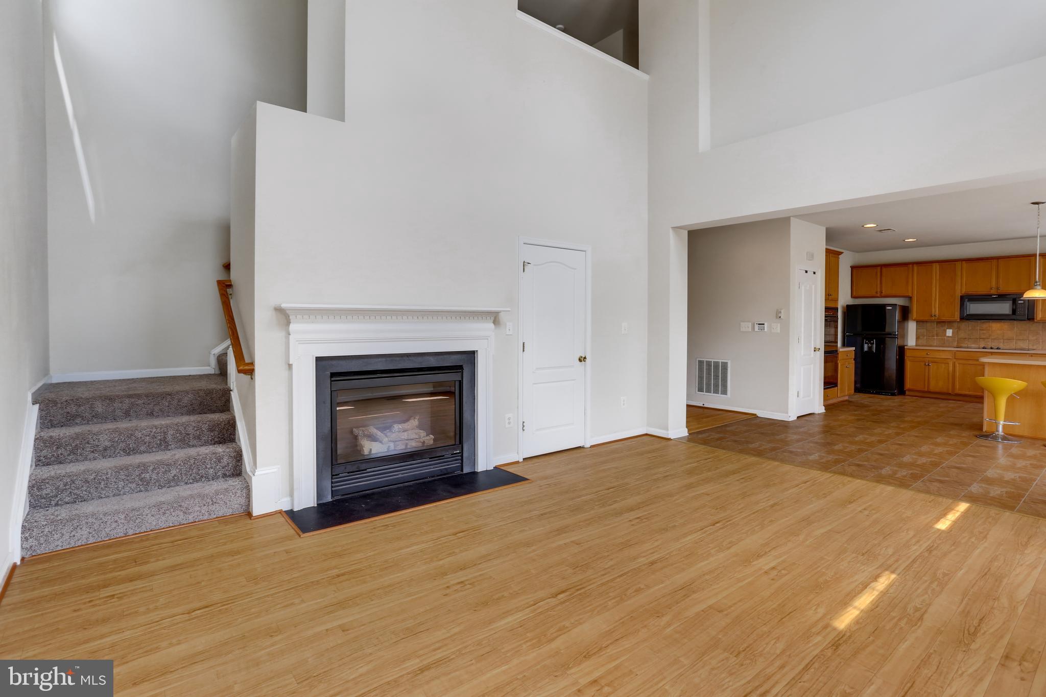 19 Rivers Edge Terrace Indian Head, MD 20640 - Photo 17 of 53 Open family room with rear staircase