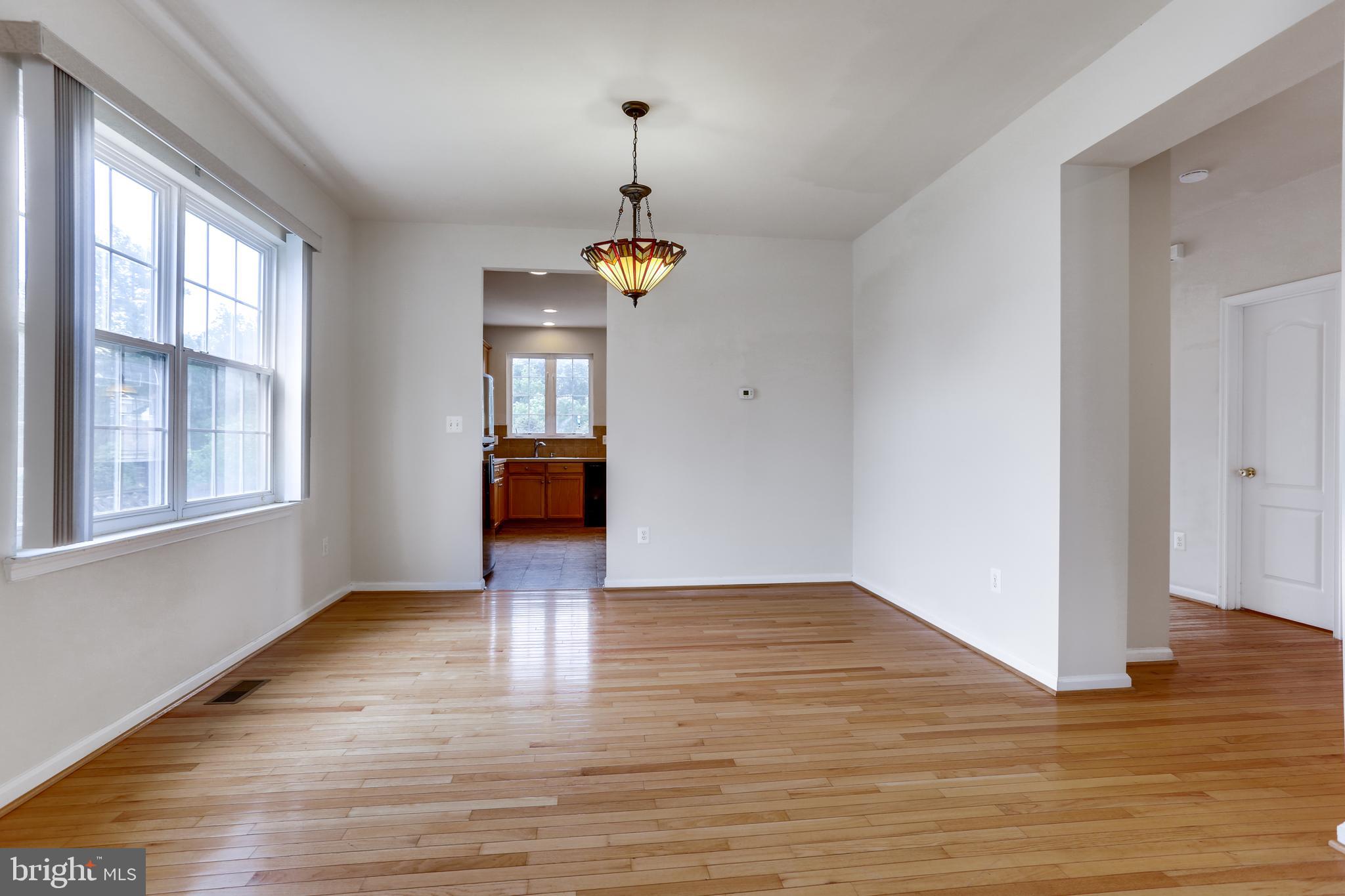 19 Rivers Edge Terrace Indian Head, MD 20640 - Photo 21 of 53 Main level foyer with open living/dining room