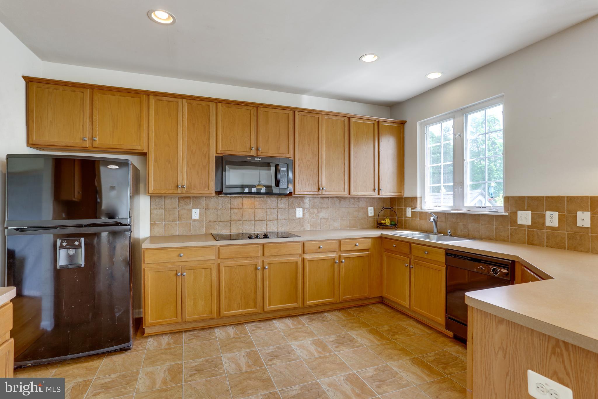 19 Rivers Edge Terrace Indian Head, MD 20640 - Photo 8 of 53 Large kitchen with cooktop & refrigerator