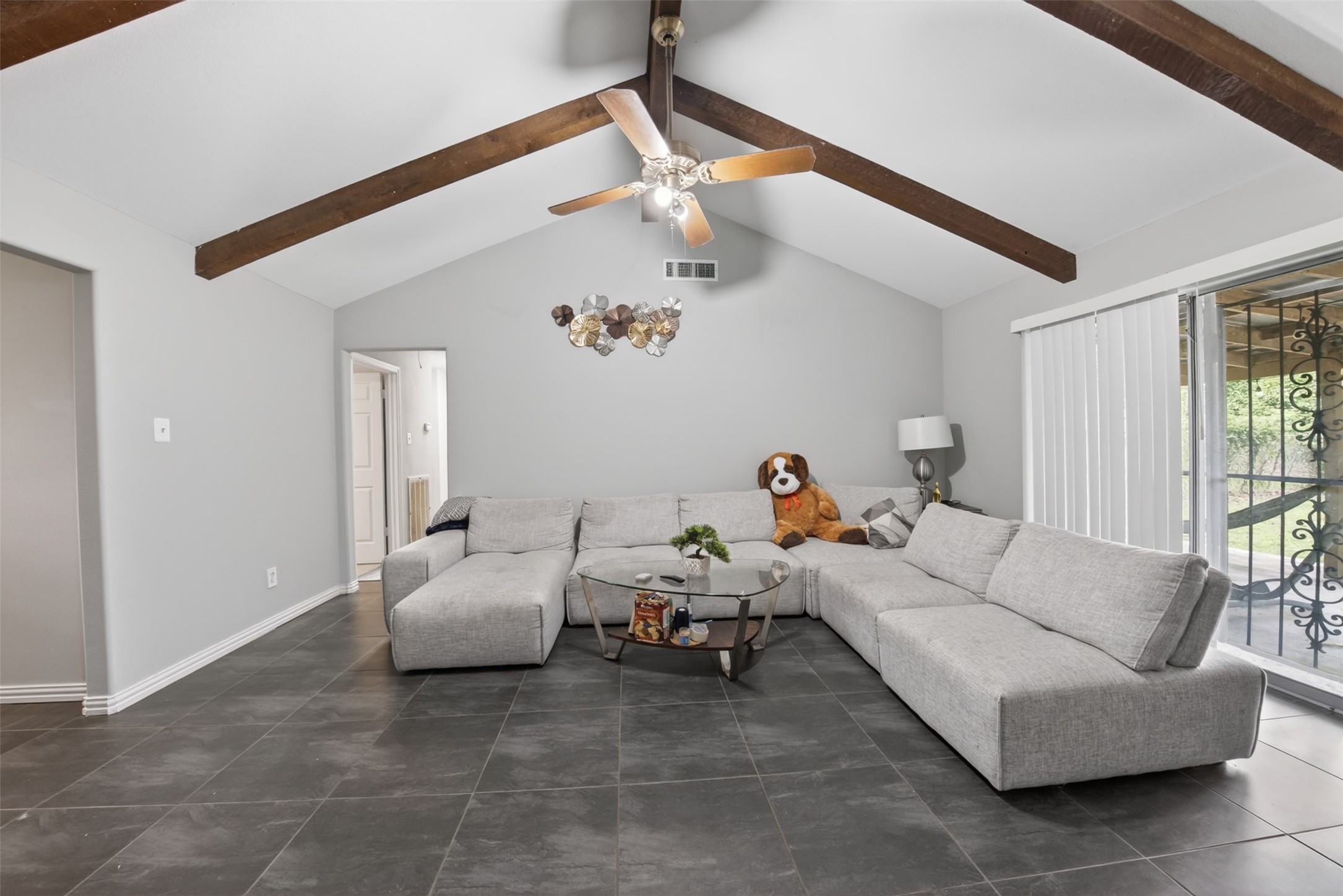 8029 Tareyton Lane Houston, TX 77075 - Photo 5 of 20 a bedroom with furniture and a chandelier fan