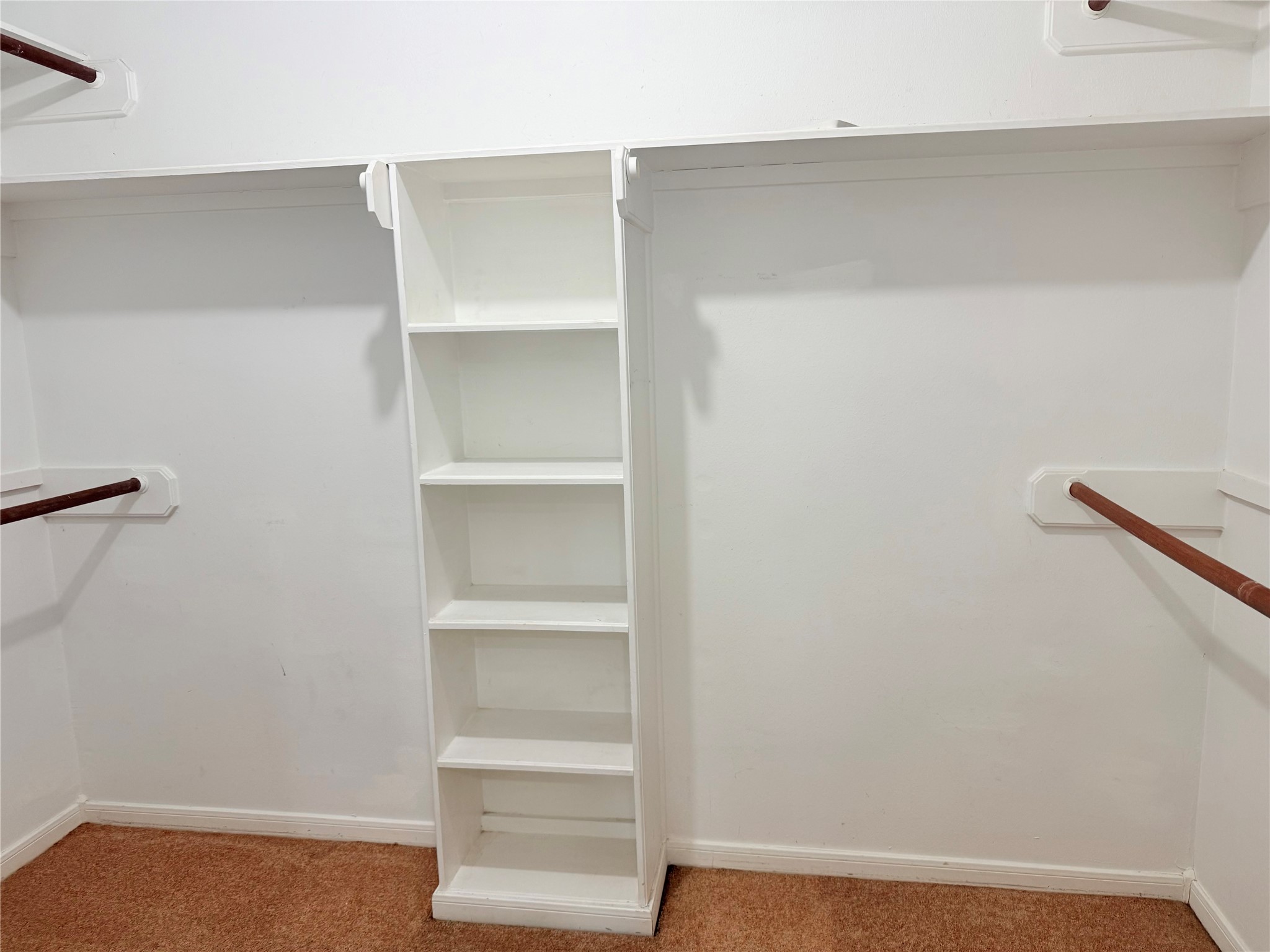 5010 Rebel Ridge Drive Sugar Land, TX 77478 - Photo 13 of 23 a view of walk in closet with empty racks