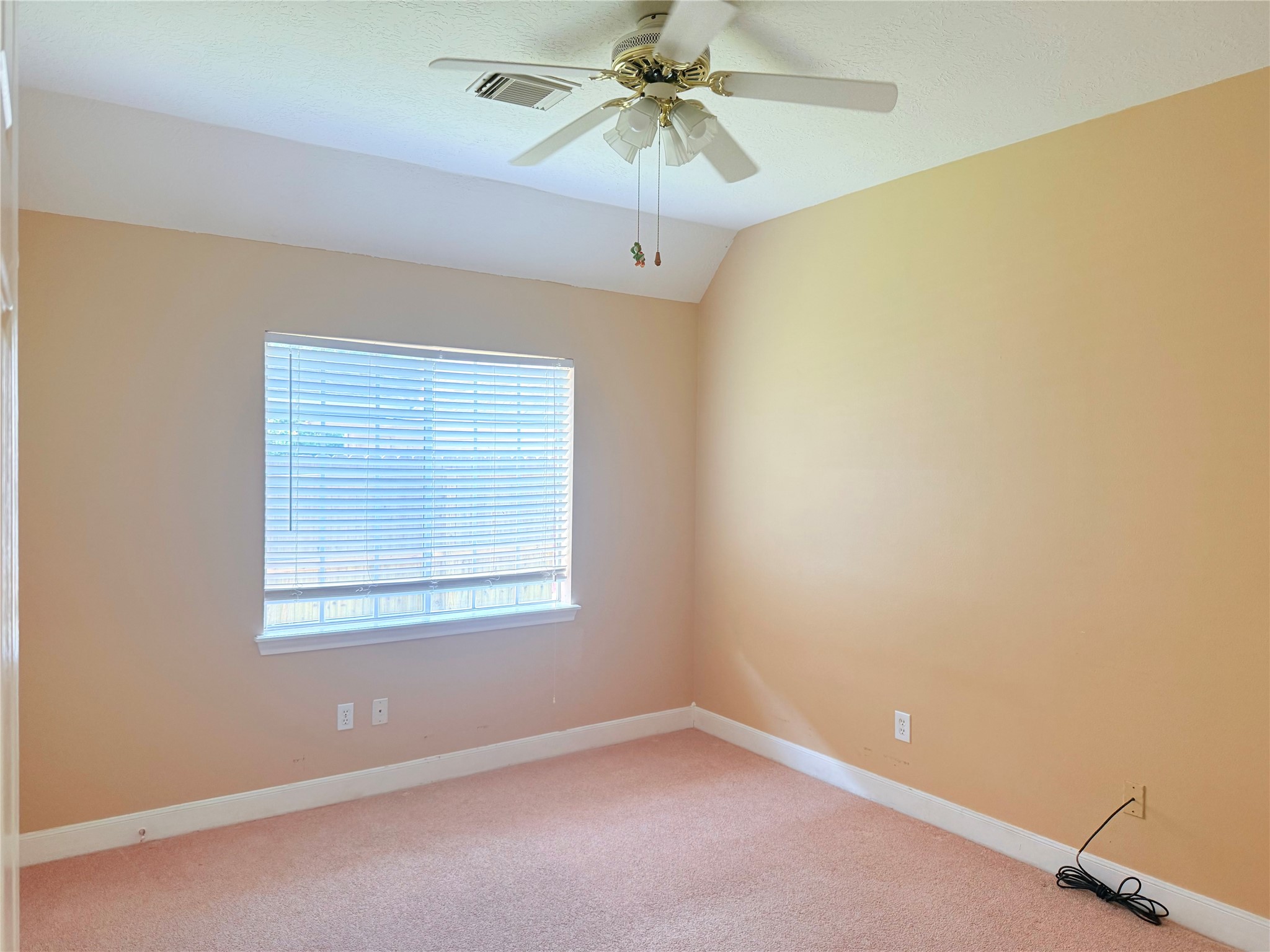 5010 Rebel Ridge Drive Sugar Land, TX 77478 - Photo 15 of 23 an empty room with a window and a fan
