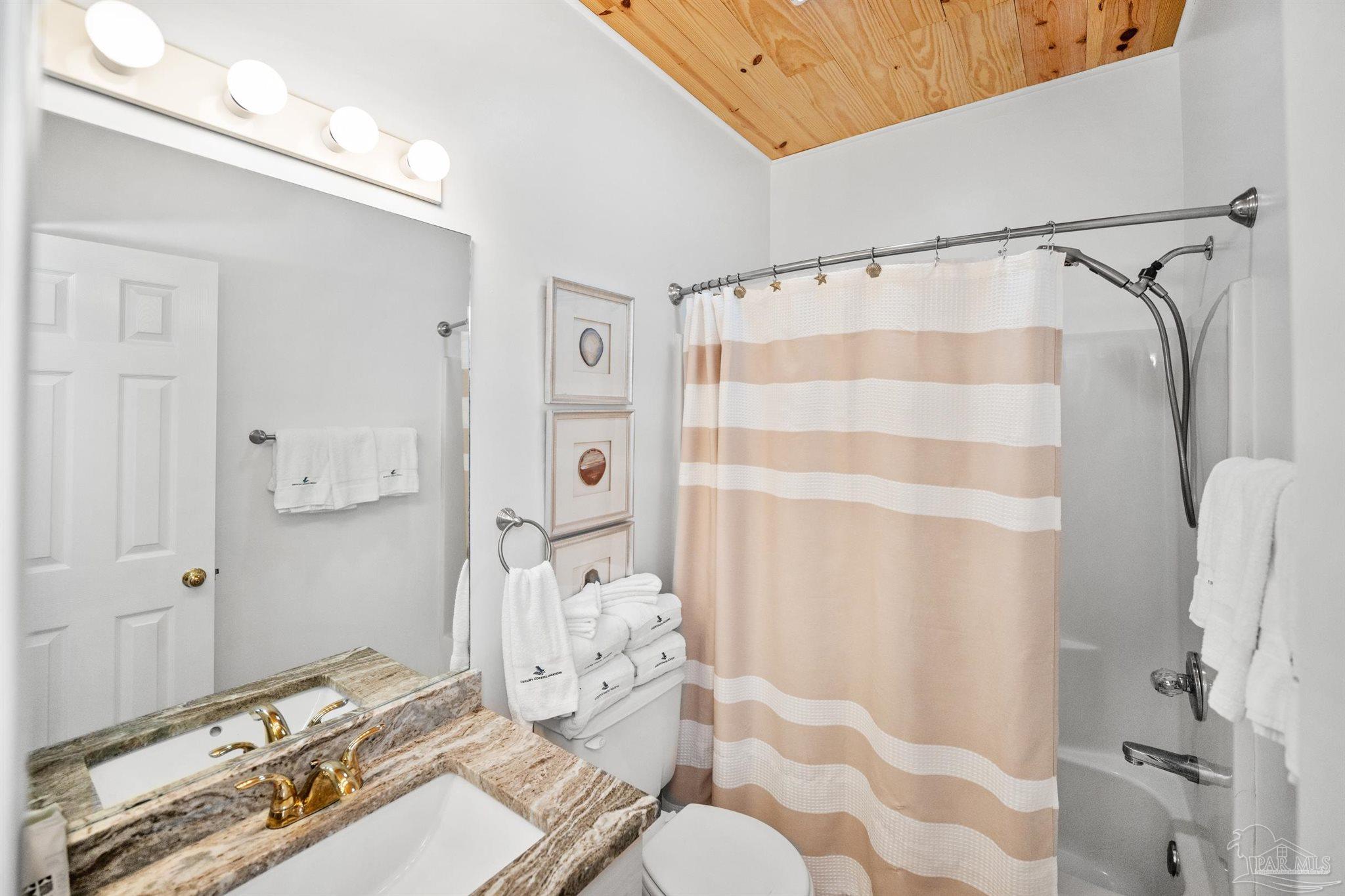 3575 Bayou Road, Unit A7 Orange Beach, AL 36561 - Photo 13 of 22 a bathroom with a sink and a shower