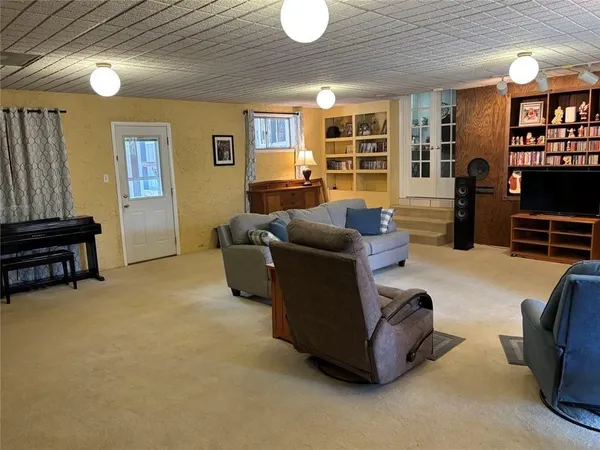 a view of a workspace with furniture