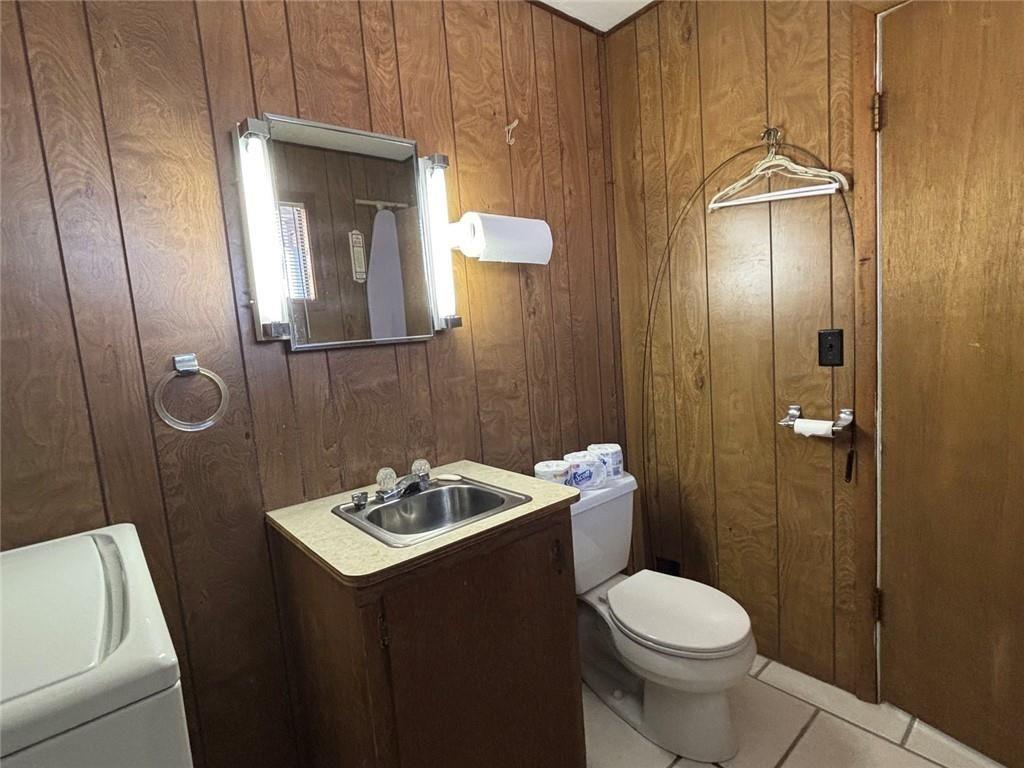 183 Barker Road Southwest Rome, GA 30165 - Photo 42 of 71 a bathroom with a sink a toilet and shower