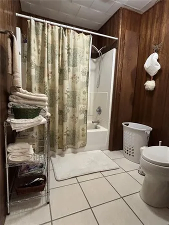 a room with lots of different colored cloths