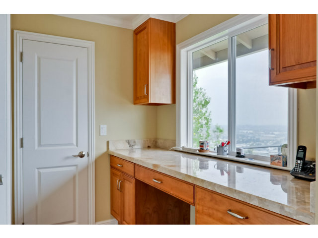 1606 Courtland Road Belmont, CA 94002 - Photo 12 of 17 a kitchen with a sink and a window