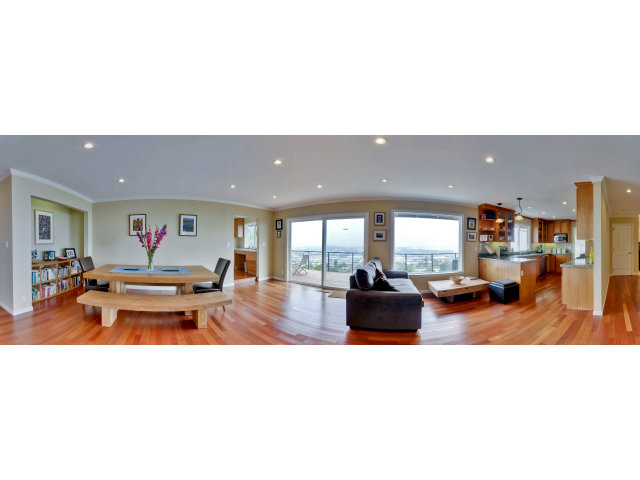 1606 Courtland Road Belmont, CA 94002 - Photo 5 of 17 a living room with furniture and a flat screen tv