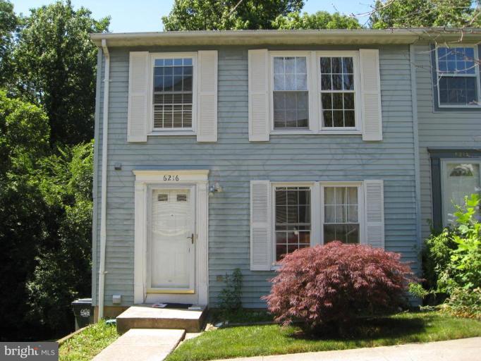 6216 Hillside Road Springfield, VA 22152 - Photo 1 of 1 a front view of a house with garden