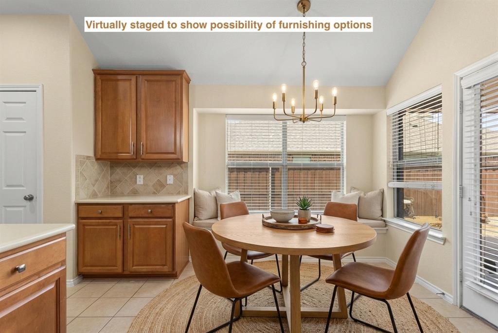 12334 Blue Ridge Drive Frisco, TX 75033 - Photo 11 of 20 a view of a dining room with furniture window and outside view