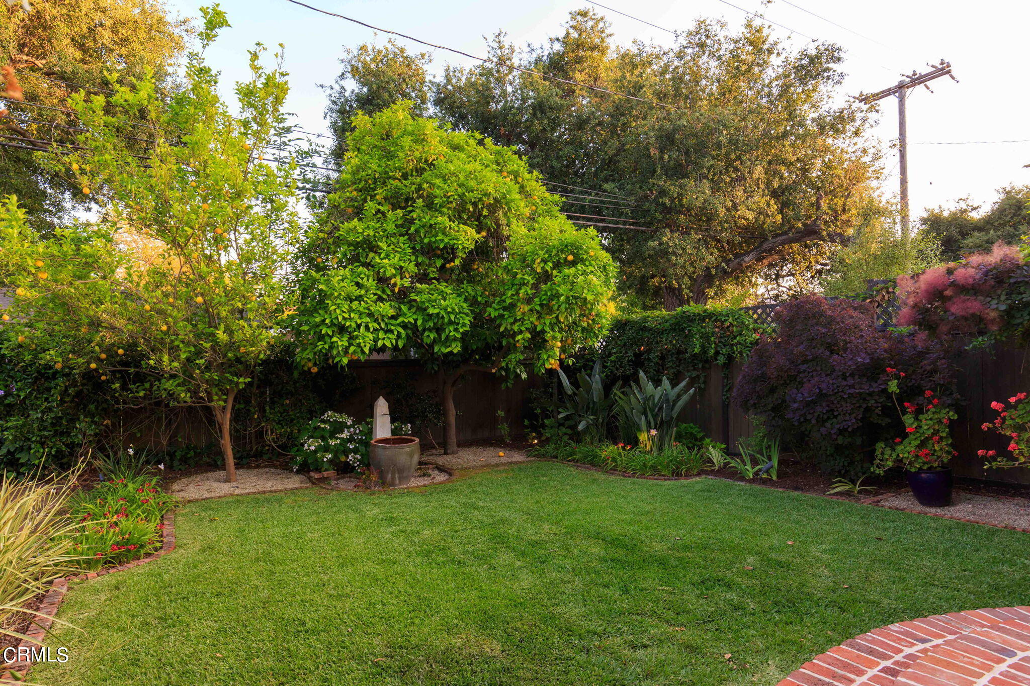 1864 Queensberry Road Pasadena, CA 91104 - Photo 34 of 40 a view of a chair and table in backyard of the house