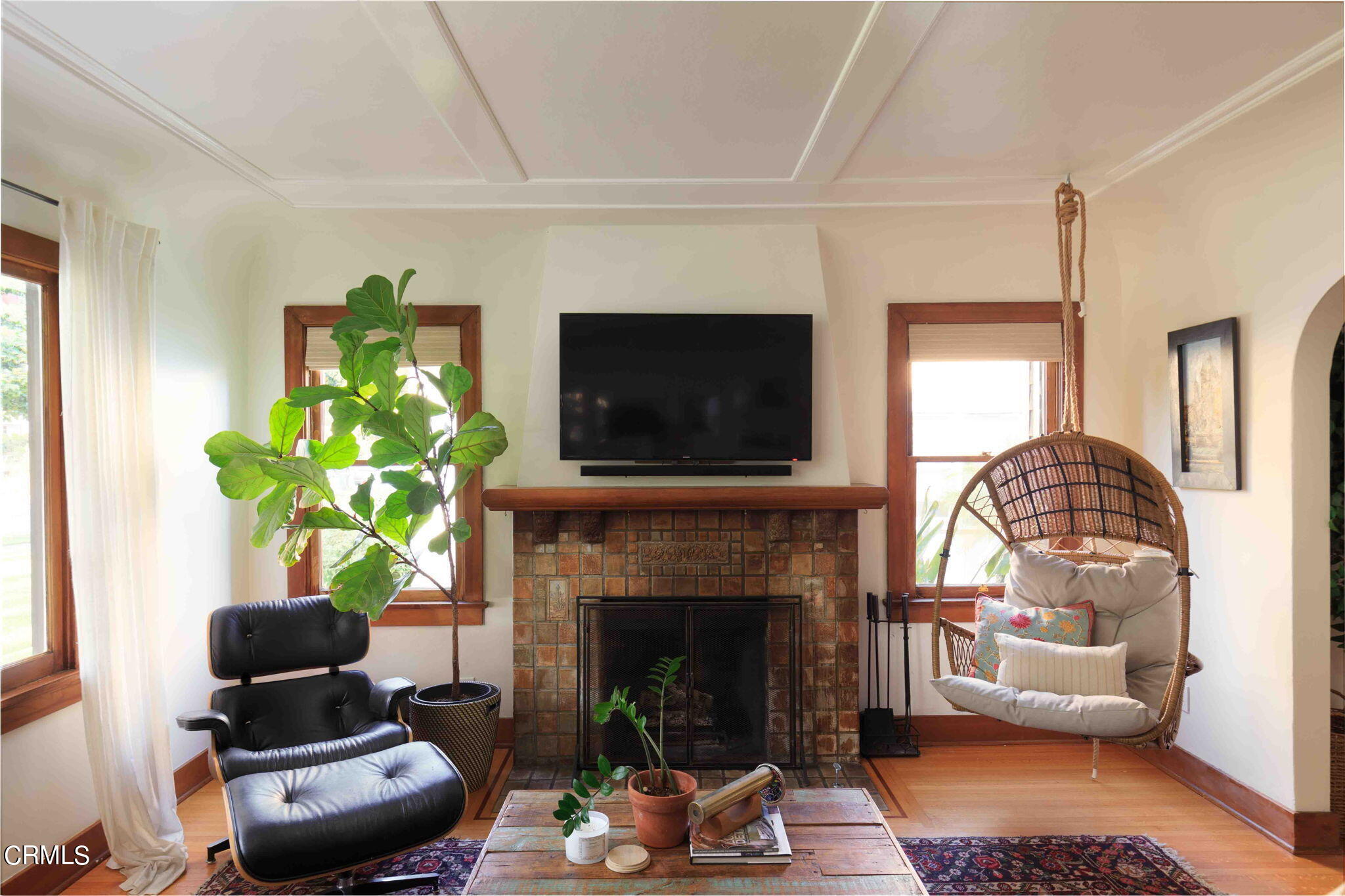 1864 Queensberry Road Pasadena, CA 91104 - Photo 6 of 40 a living room with furniture a flat screen tv and a fireplace