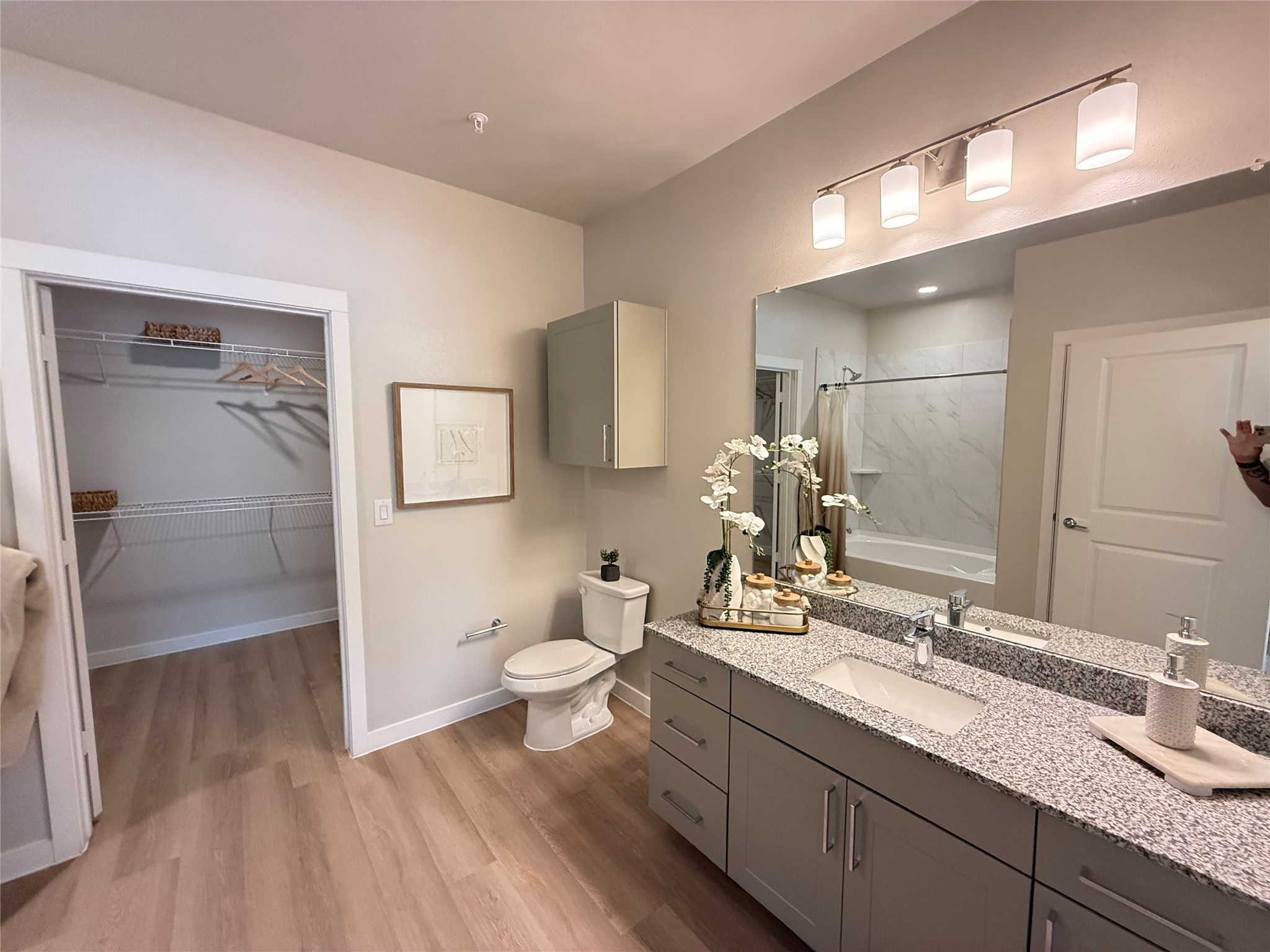 1610 Campbell Road, Unit B4 395 Houston, TX 77055 - Photo 8 of 12 a bathroom with a sink and a mirror