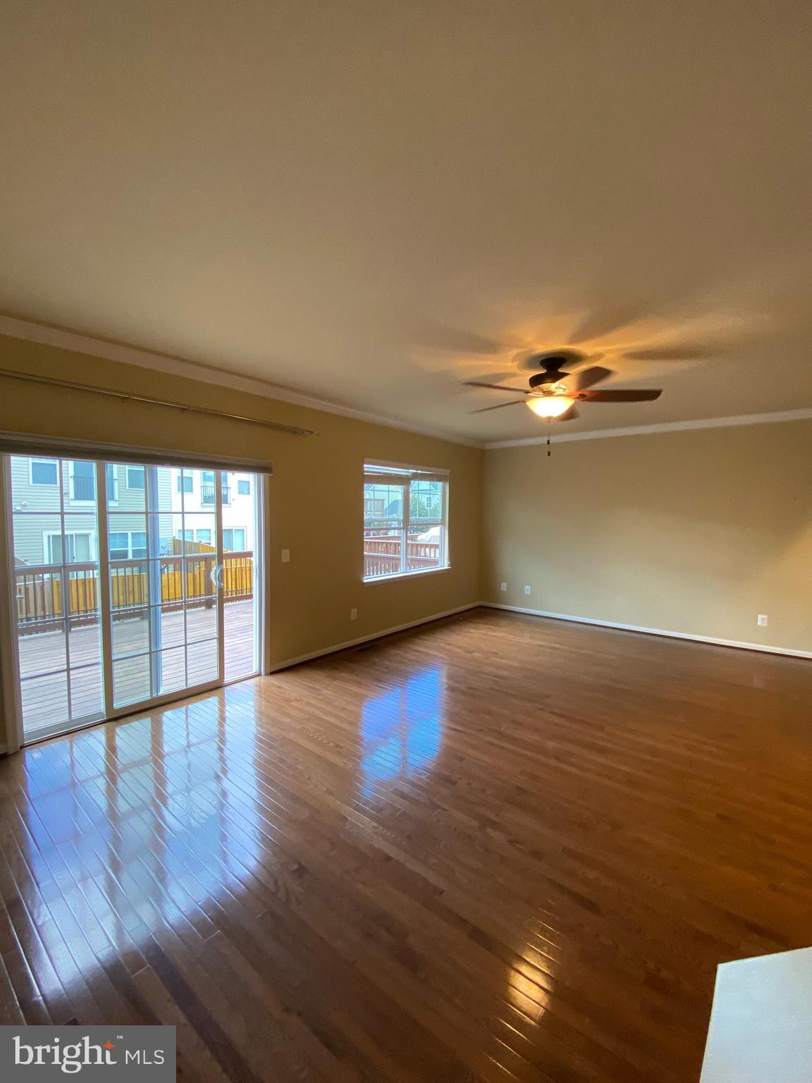 104 Gretchen Court Stephenson, VA 22656 - Photo 22 of 40 a view of an empty room with window and wooden floor