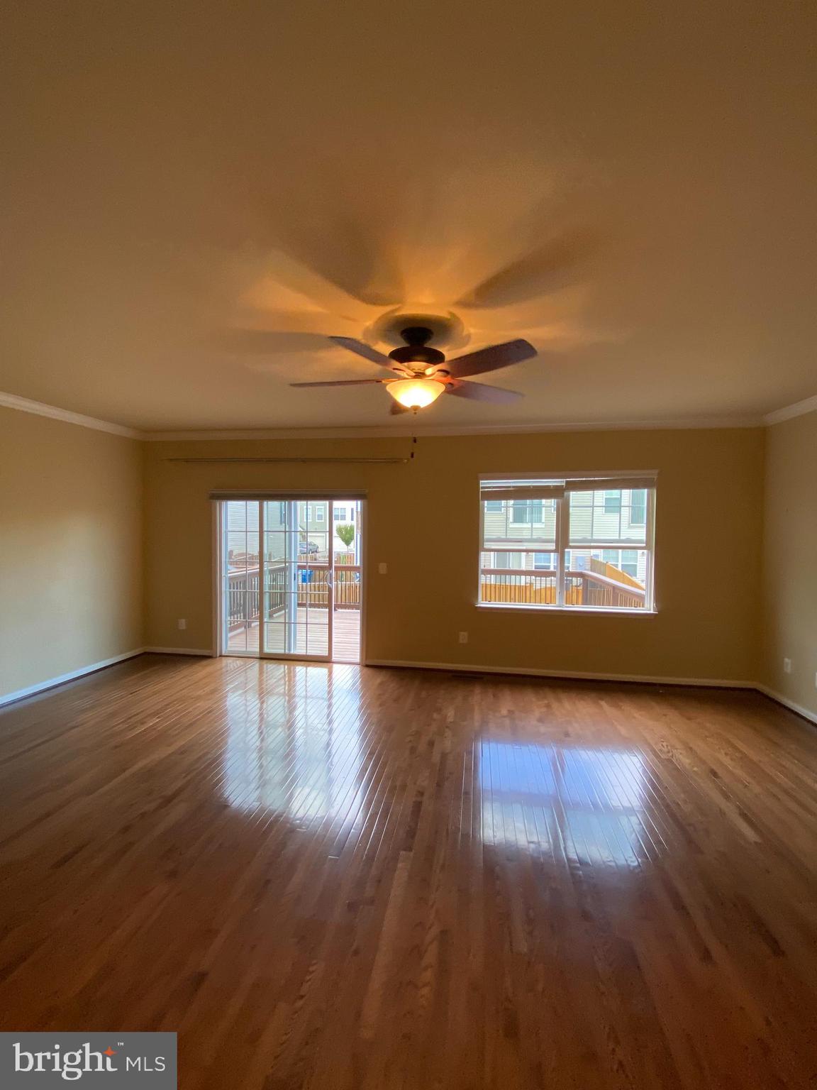 104 Gretchen Court Stephenson, VA 22656 - Photo 23 of 40 a view of an empty room with wooden floor and a window