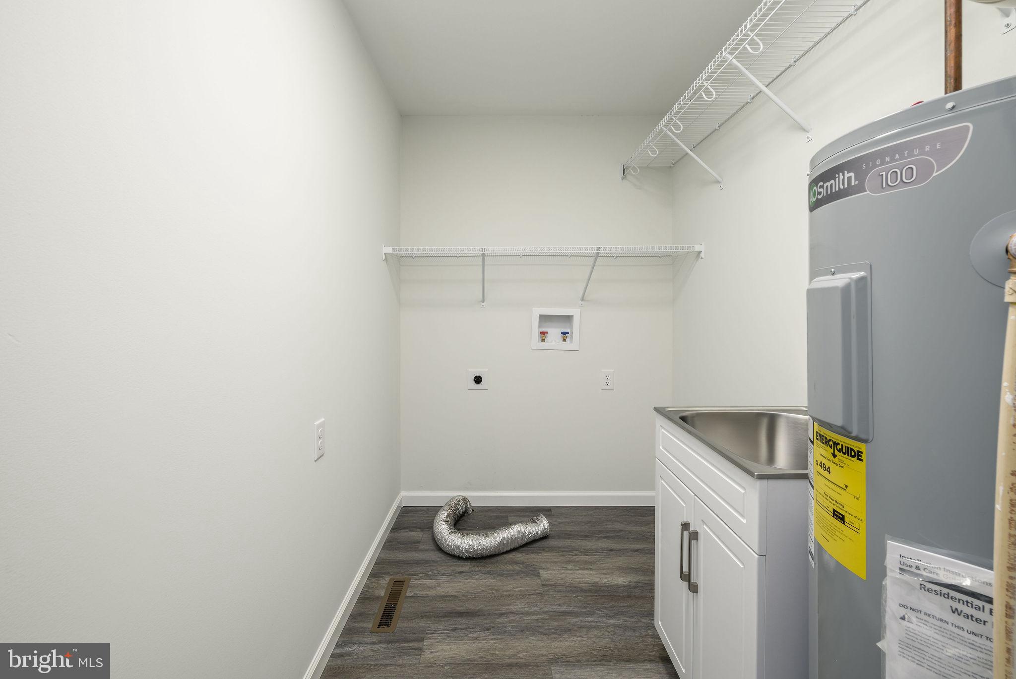 16853 Sherbrooke Road Lewes, DE 19958 - Photo 18 of 32 a room with storage and utility