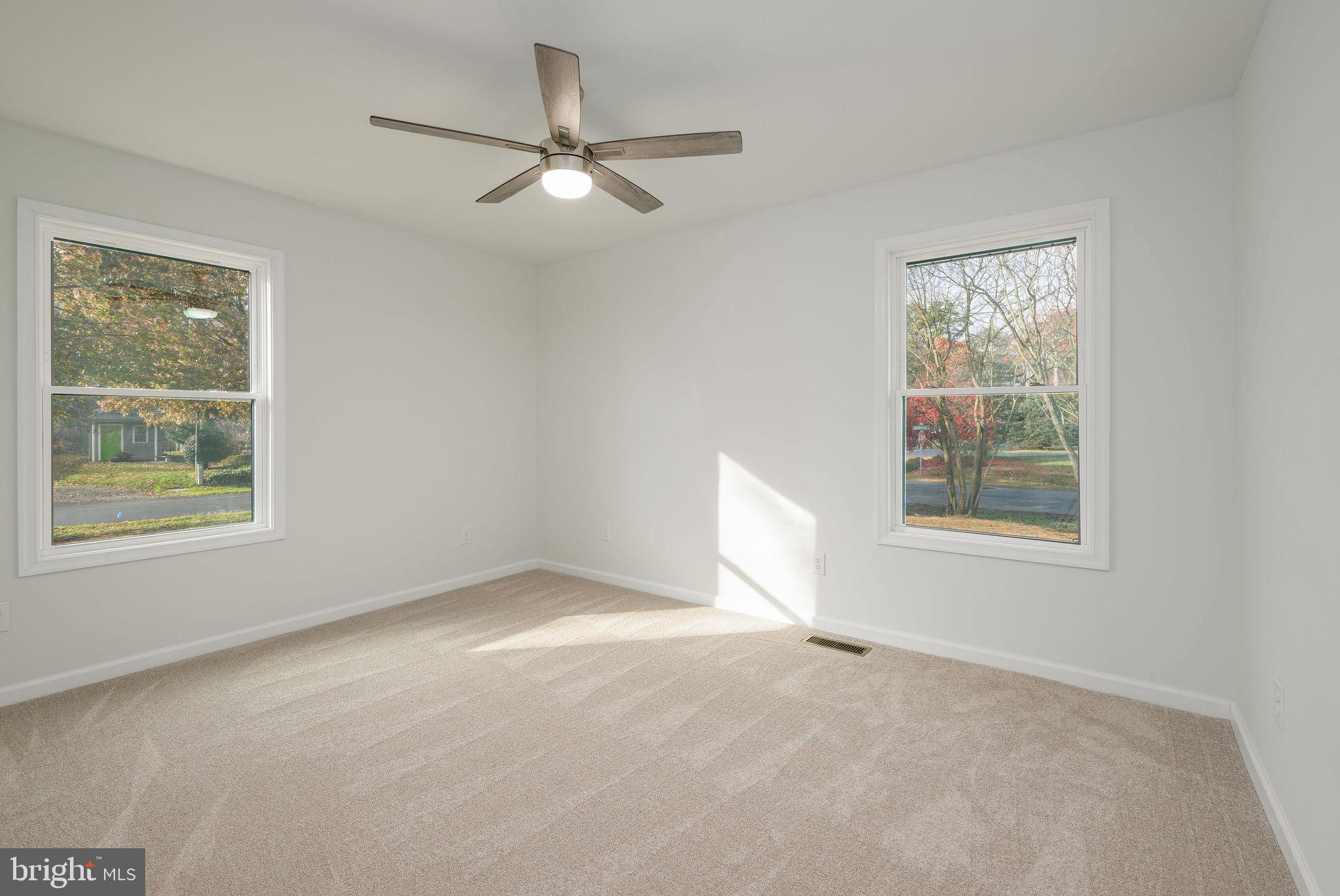 16853 Sherbrooke Road Lewes, DE 19958 - Photo 22 of 32 a view of an empty room with a window