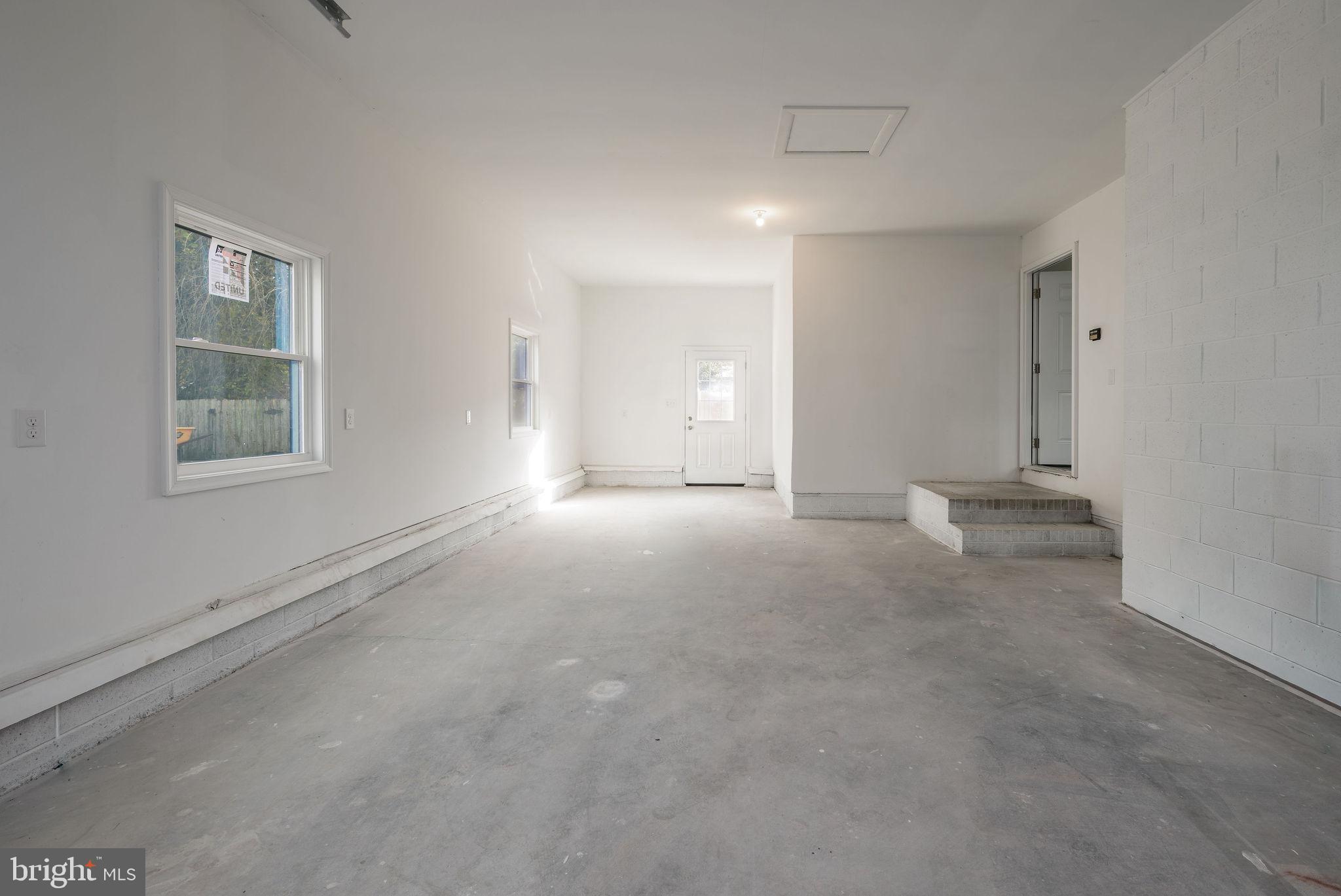 16853 Sherbrooke Road Lewes, DE 19958 - Photo 29 of 32 a view of empty room with windows