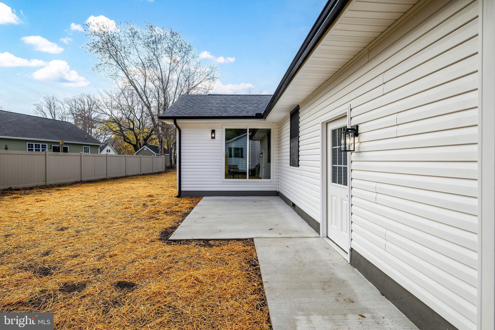 16853 Sherbrooke Road Lewes, DE 19958 - Photo 6 of 32 a view of backyard of house