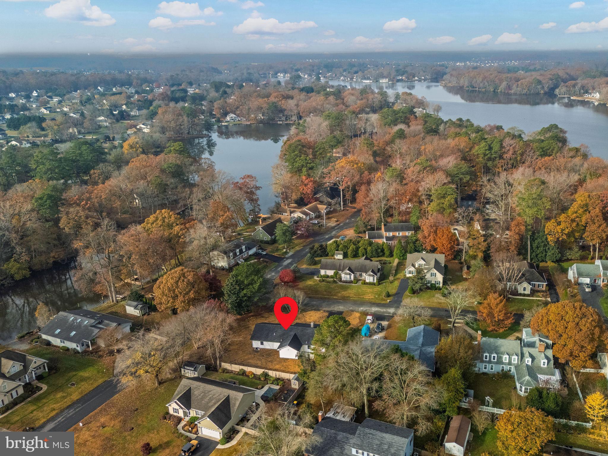 16853 Sherbrooke Road Lewes, DE 19958 - Photo 8 of 32 an aerial view of residential houses with outdoor space