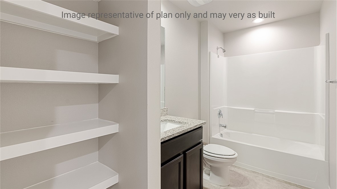 1509 Choctaw Road Sinton, TX 78387 - Photo 14 of 30 a bathroom with a sink a toilet and shower