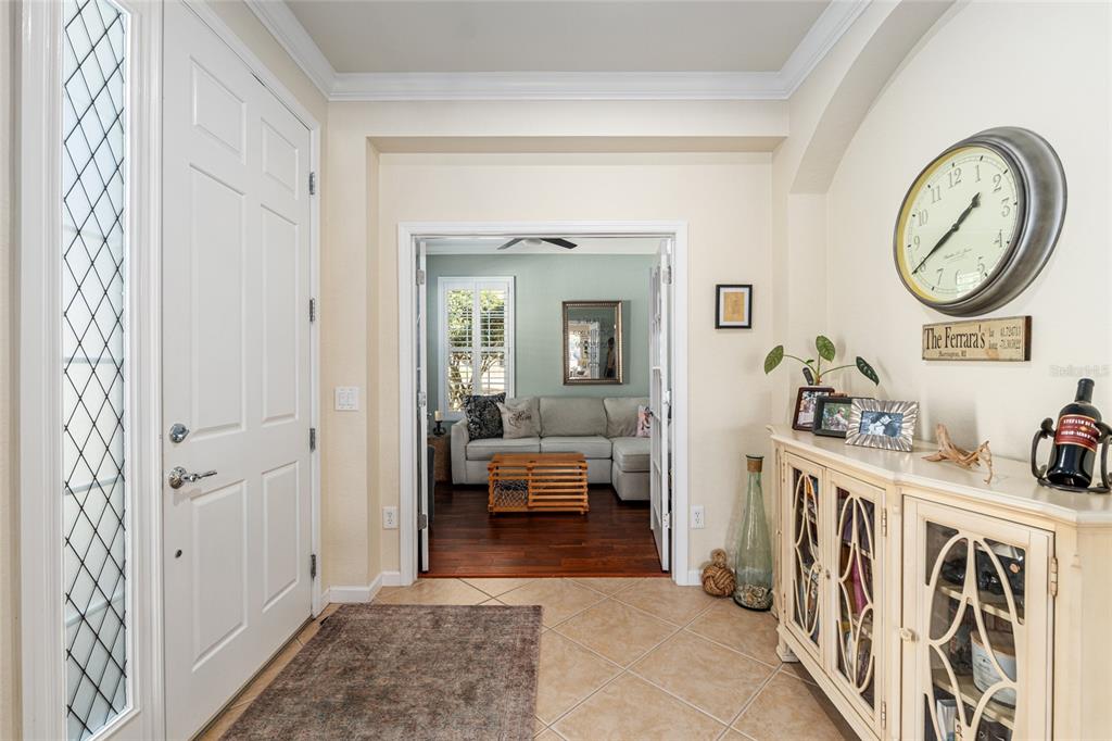 9595 Southwest 70th Loop Ocala, FL 34481 - Photo 19 of 100 a view of an entryway with workspace and a livingroom view