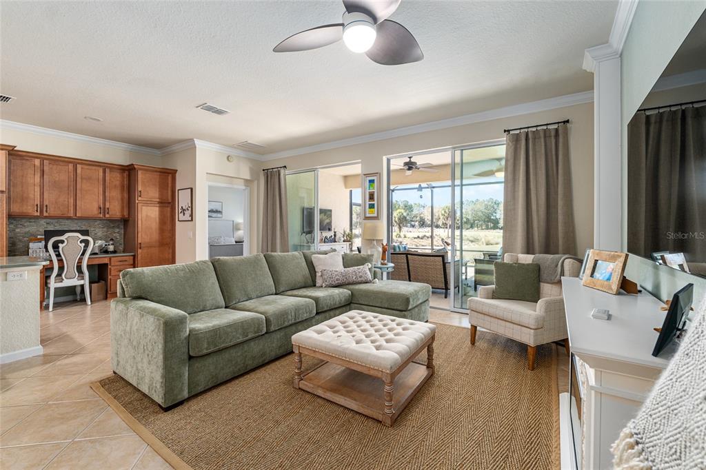 9595 Southwest 70th Loop Ocala, FL 34481 - Photo 26 of 100 a living room with furniture and a large window