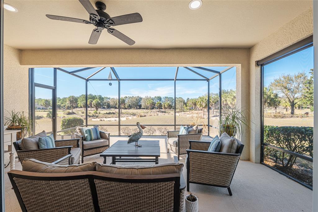 9595 Southwest 70th Loop Ocala, FL 34481 - Photo 42 of 100 a living room with furniture and a large window